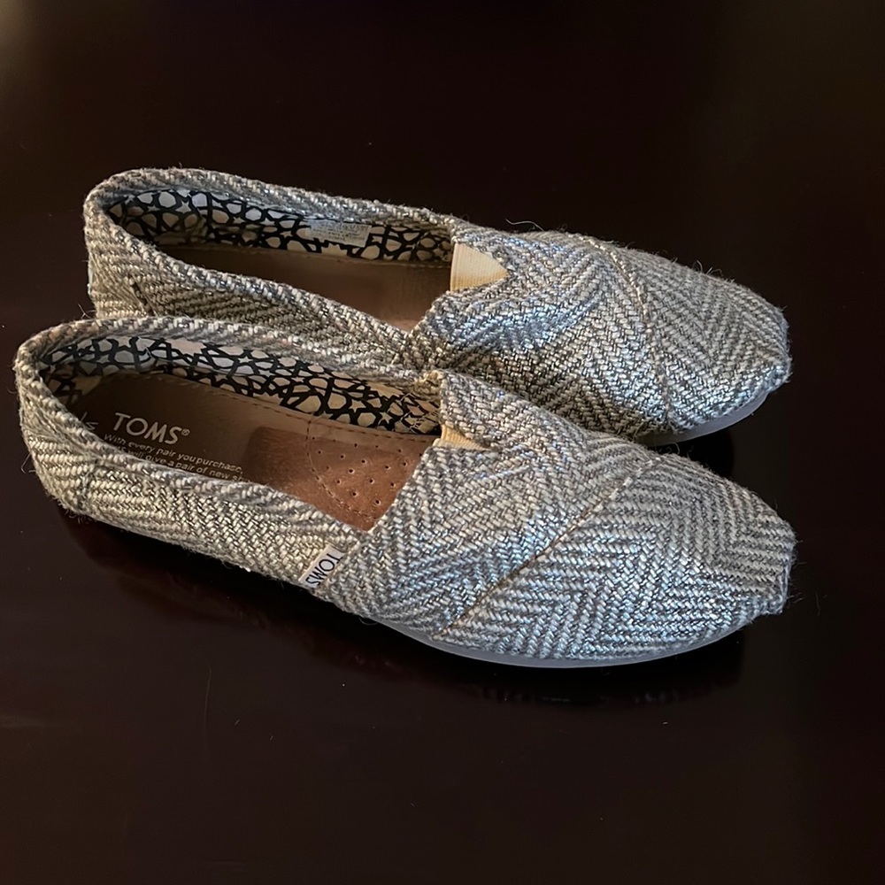 TOMS silver & white slip-ons. 8